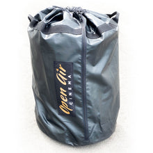 Load image into Gallery viewer, 20 ft inflatable screen packed in a bag
