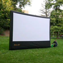 Load image into Gallery viewer, 16’ x 9’ Inflatable Screen on a lawn

